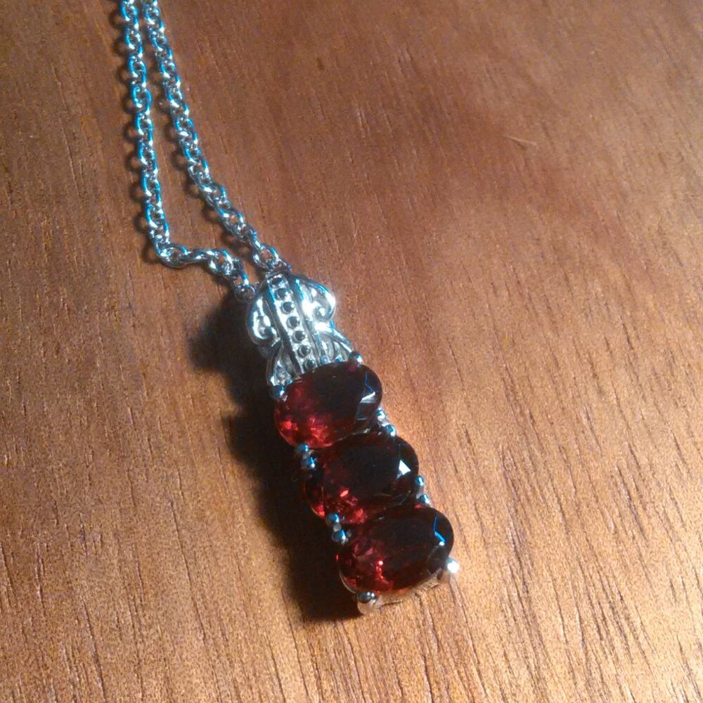 Mozambique Garnet Three Stone Stainless Steel Pendant Necklace